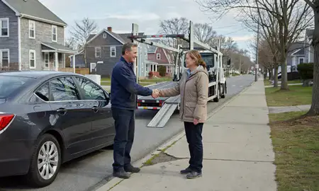 Vehicle owner beside their delivered car in Bangor, Maine, United States