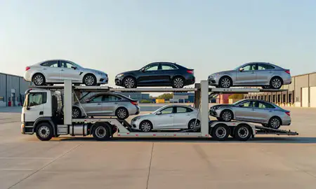 Car transporter parked in an industrial area of Bangor, Maine, United States