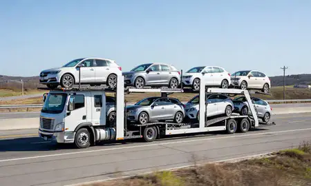 Multi-level car carrier on the highway to Lisbon, Maine, United States
