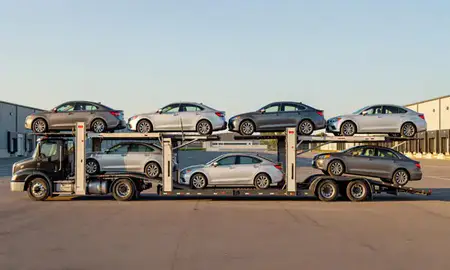 Car transporter parked in an industrial area of North Windham, Maine, United States
