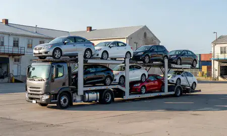 Car transporter loaded with vehicles in Old Town, Maine, United States