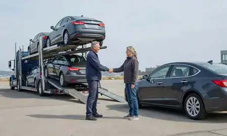 Vehicle owner beside their delivered car in Portland, Maine, United States
