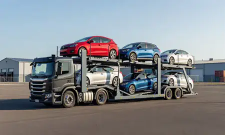 Car transporter loaded with vehicles in Rockland, Maine, United States