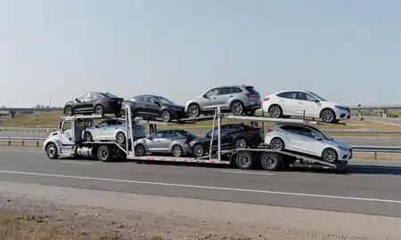Multi-level car carrier on the highway to South Berwick, Maine, United States