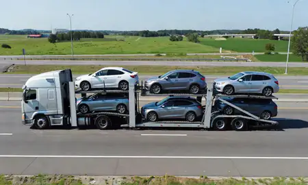 Multi-level car carrier on the highway to Annapolis, Maryland, United States