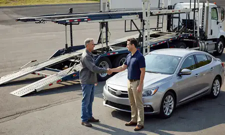 Vehicle owner beside their delivered car in Bowie, Maryland, United States