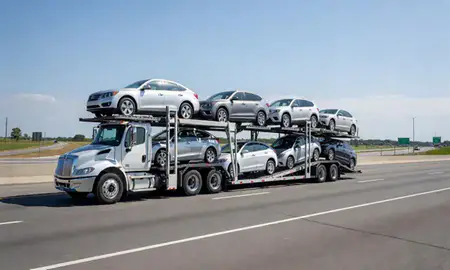 Multi-level car carrier on the highway to Clinton, Maryland, United States