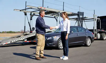 Vehicle owner beside their delivered car in Frederick, Maryland, United States