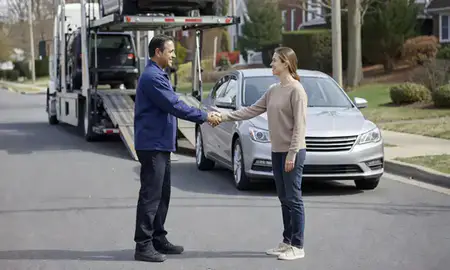 Vehicle owner beside their delivered car in Germantown, Maryland, United States