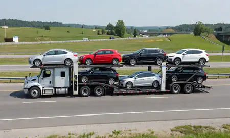 Multi-level car carrier on the highway to Hagerstown, Maryland, United States
