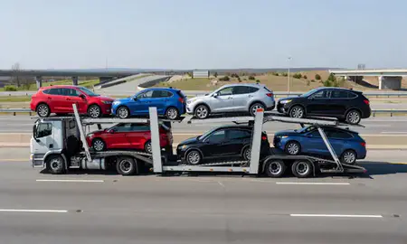 Multi-level car carrier on the highway to Rockville, Maryland, United States