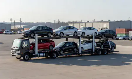 Car transporter loaded with vehicles in Massachusetts, United States