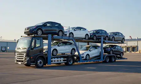 Car transporter loaded with vehicles in Cambridge, Massachusetts, United States