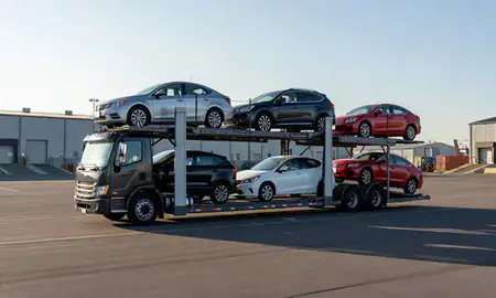 Car transporter loaded with vehicles in Everett, Massachusetts, United States
