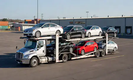 Car transporter loaded with vehicles in Fitchburg, Massachusetts, United States