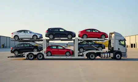 Car transporter parked in an industrial area of Lowell, Massachusetts, United States