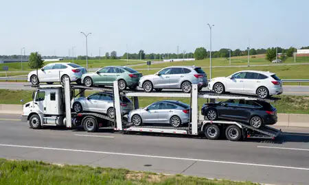 Multi-level car carrier on the highway to Methuen Town, Massachusetts, United States