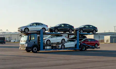 Car transporter loaded with vehicles in Salem, Massachusetts, United States
