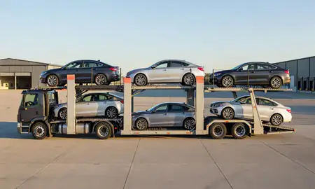 Car transporter parked in an industrial area of Springfield, Massachusetts, United States