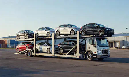 Car transporter loaded with vehicles in Springfield, Massachusetts, United States