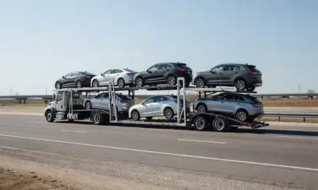 Multi-level car carrier on the highway to Dearborn Heights, Michigan, United States