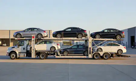 Car transporter parked in an industrial area of Dearborn Heights, Michigan, United States