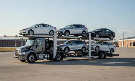Car transporter loaded with vehicles in Dearborn, Michigan, United States