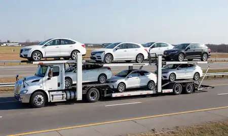 Multi-level car carrier on the highway to Farmington Hills, Michigan, United States