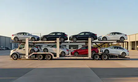 Car transporter parked in an industrial area of Farmington Hills, Michigan, United States
