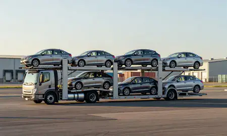 Car transporter loaded with vehicles in Jackson, Michigan, United States
