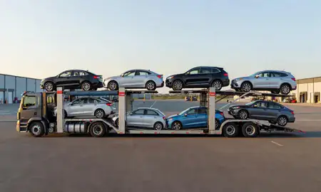 Car transporter parked in an industrial area of Novi, Michigan, United States
