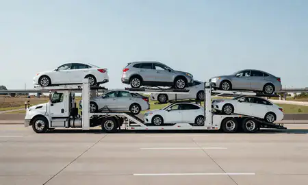 Multi-level car carrier on the highway to Pontiac, Michigan, United States