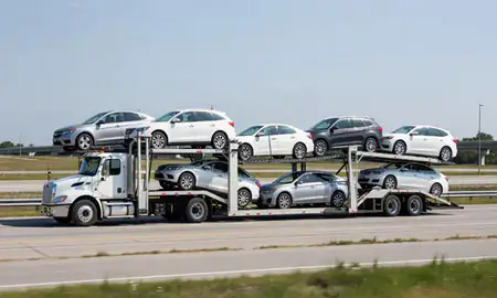 Multi-level car carrier on the highway to Port Huron, Michigan, United States