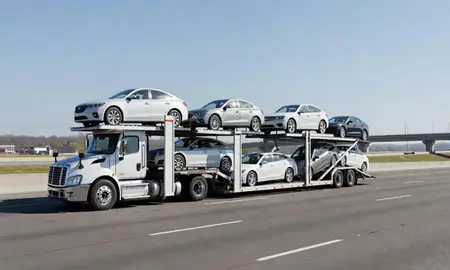 Multi-level car carrier on the highway to Rochester Hills, Michigan, United States