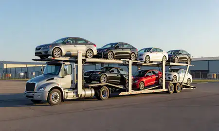 Car transporter loaded with vehicles in Rochester Hills, Michigan, United States