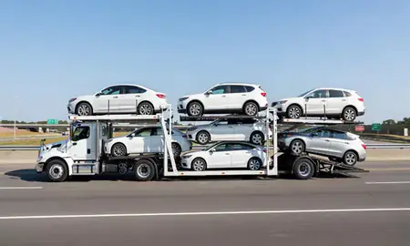 Multi-level car carrier on the highway to Royal Oak, Michigan, United States