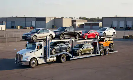 Car transporter loaded with vehicles in Saginaw, Michigan, United States