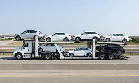 Multi-level car carrier on the highway to Sterling Heights, Michigan, United States