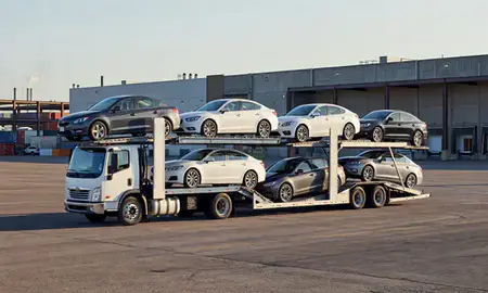 Car transporter loaded with vehicles in Warren, Michigan, United States