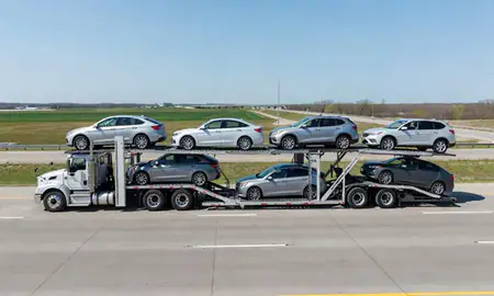 Multi-level car carrier on the highway to Andover, Minnesota, United States