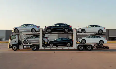 Car transporter parked in an industrial area of Coon Rapids, Minnesota, United States