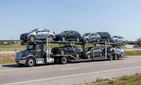 Multi-level car carrier on the highway to Lakeville, Minnesota, United States