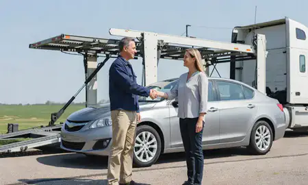 Vehicle owner beside their delivered car in Maple Grove, Minnesota, United States