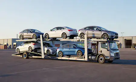 Car transporter loaded with vehicles in Maplewood, Minnesota, United States
