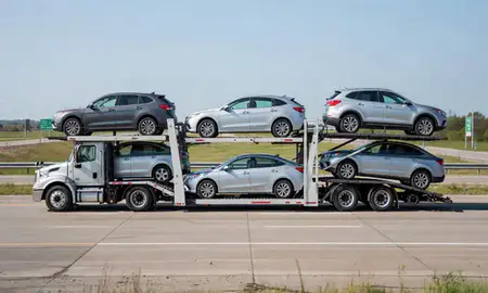 Multi-level car carrier on the highway to Plymouth, Minnesota, United States
