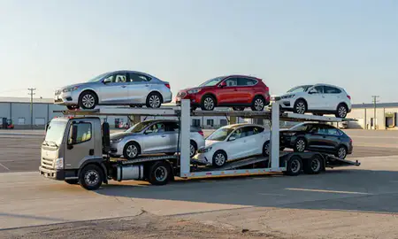 Car transporter loaded with vehicles in Mississippi, United States