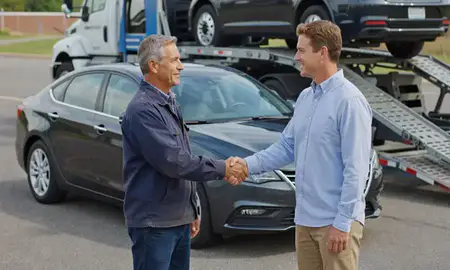 Vehicle owner beside their delivered car in Hattiesburg, Mississippi, United States
