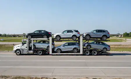 Multi-level car carrier on the highway to Laurel, Mississippi, United States