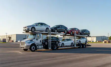 Car transporter loaded with vehicles in Laurel, Mississippi, United States