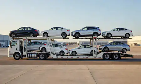 Car transporter parked in an industrial area of Long Beach, Mississippi, United States